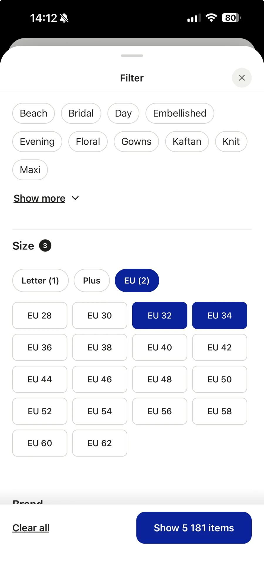 The filter menu with EU sizes 32 and 34 selected across brands